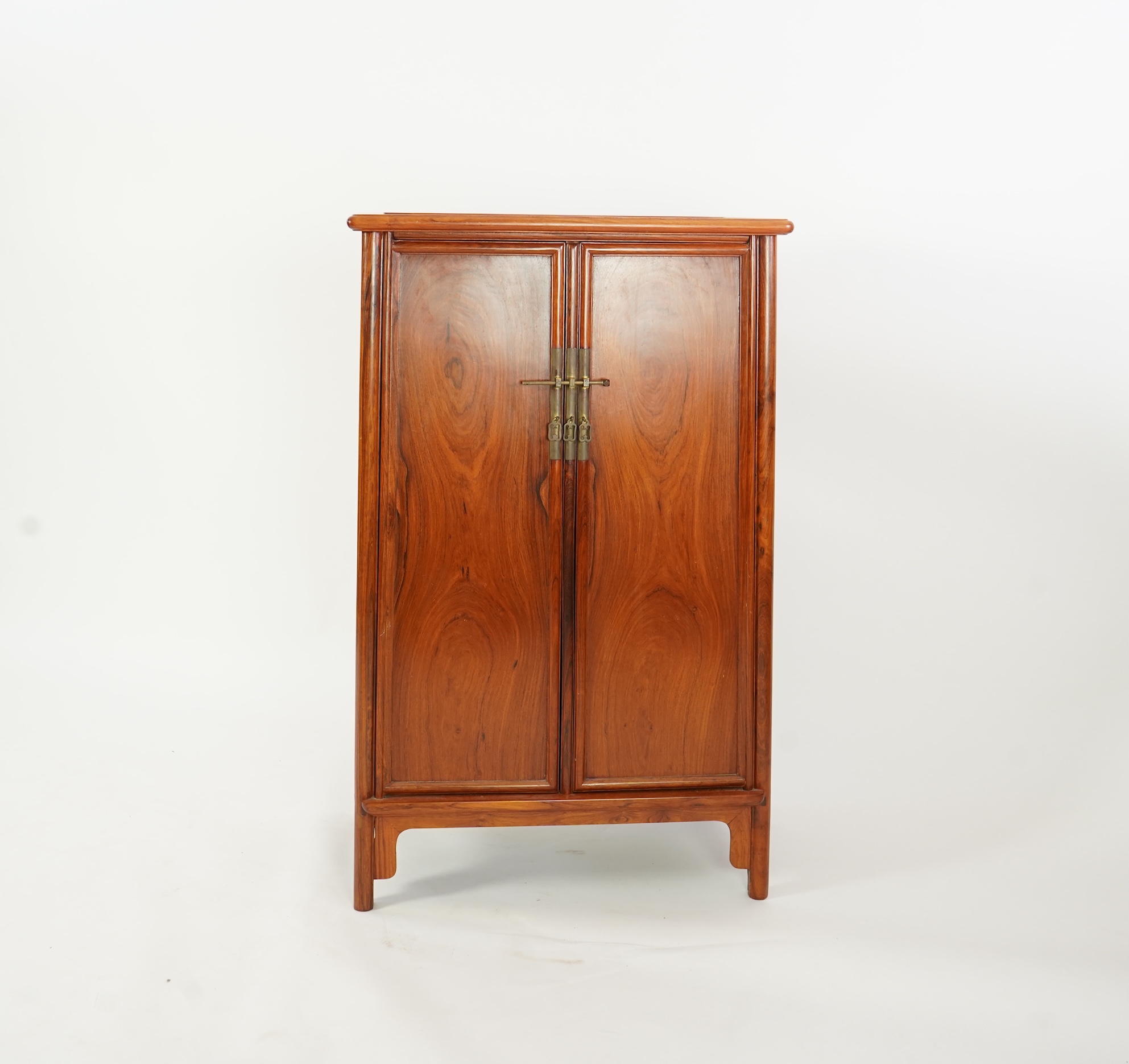 A Chinese huanghuali round-corner cabinet, yuanjiaogui, 19th/20th century